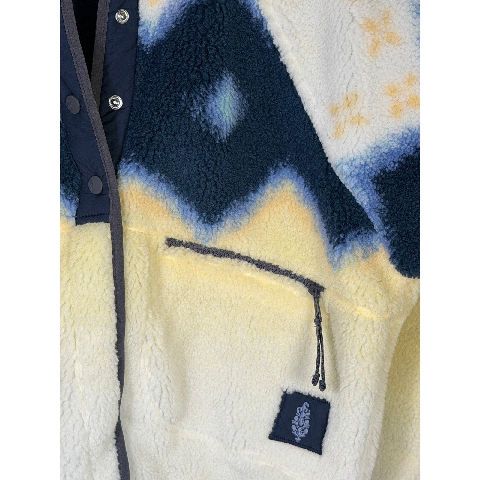 Free People women's Soft Glow Sun combo fleece jacket in yellow and blue, size S, showing the cozy front and vibrant colors.