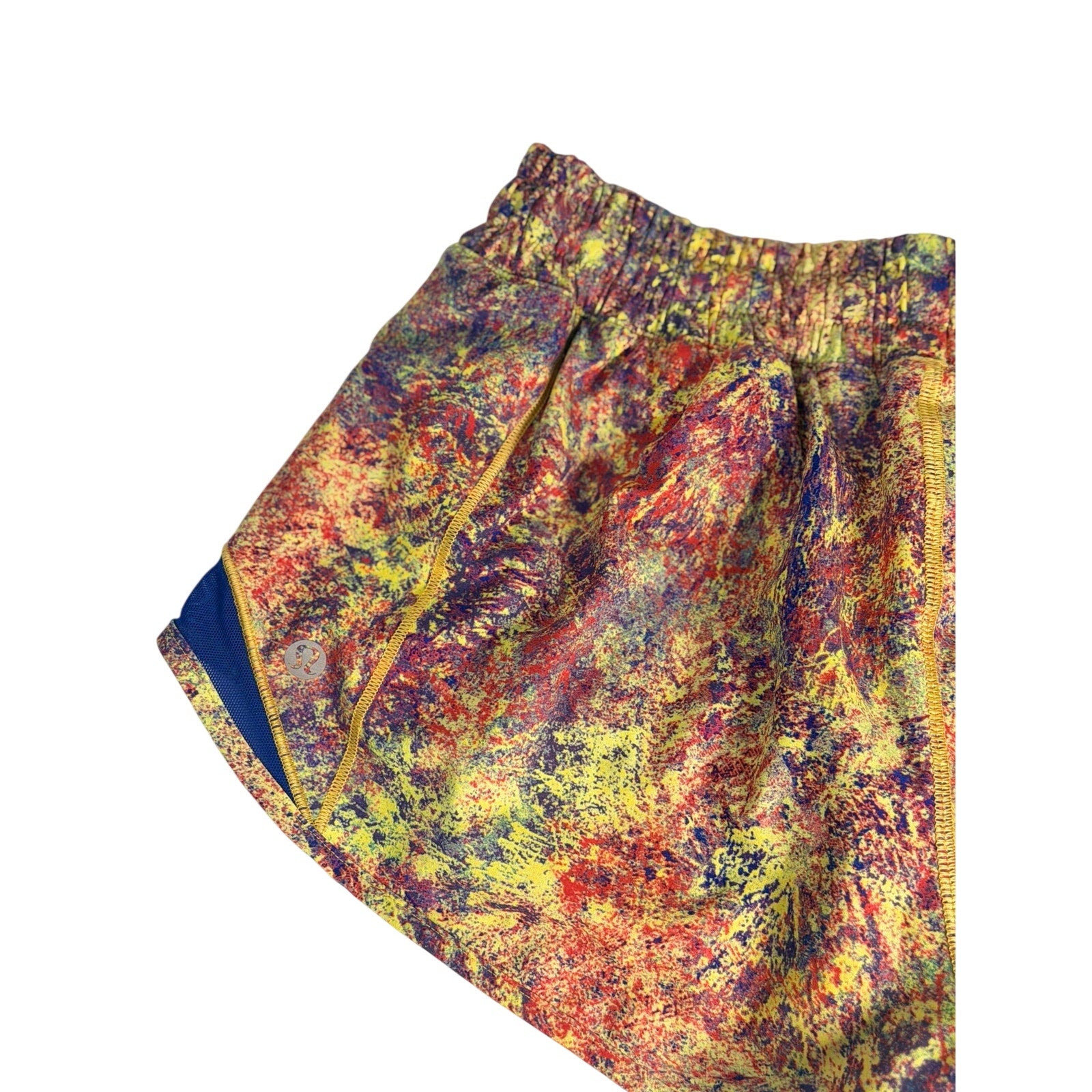 Lululemon women's multicolor printed running shorts in navy, size 6, with lightweight fabric and athletic design.