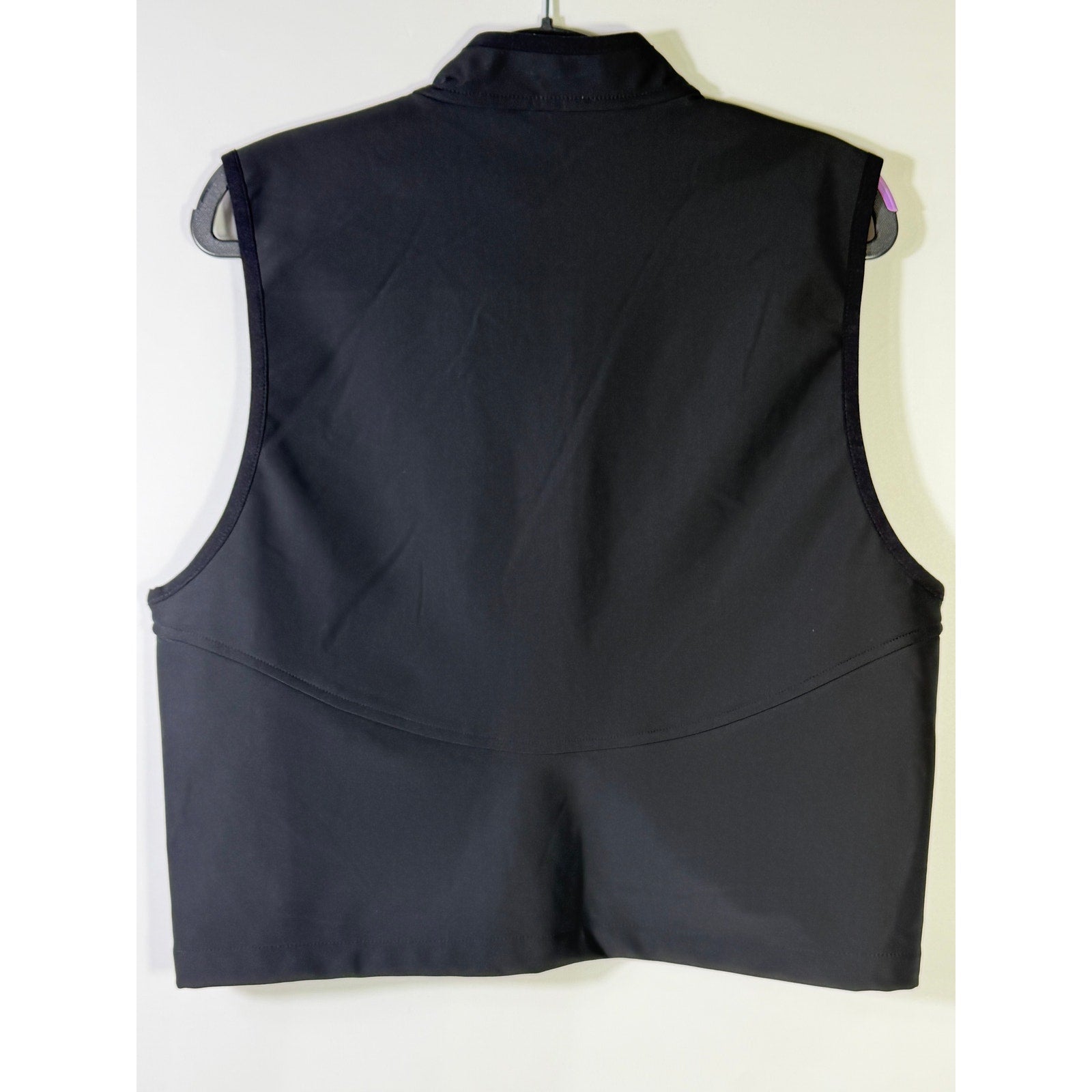 Men's black Bad Birdie softshell golf vest with full zip, size medium, shown on a hanger.
