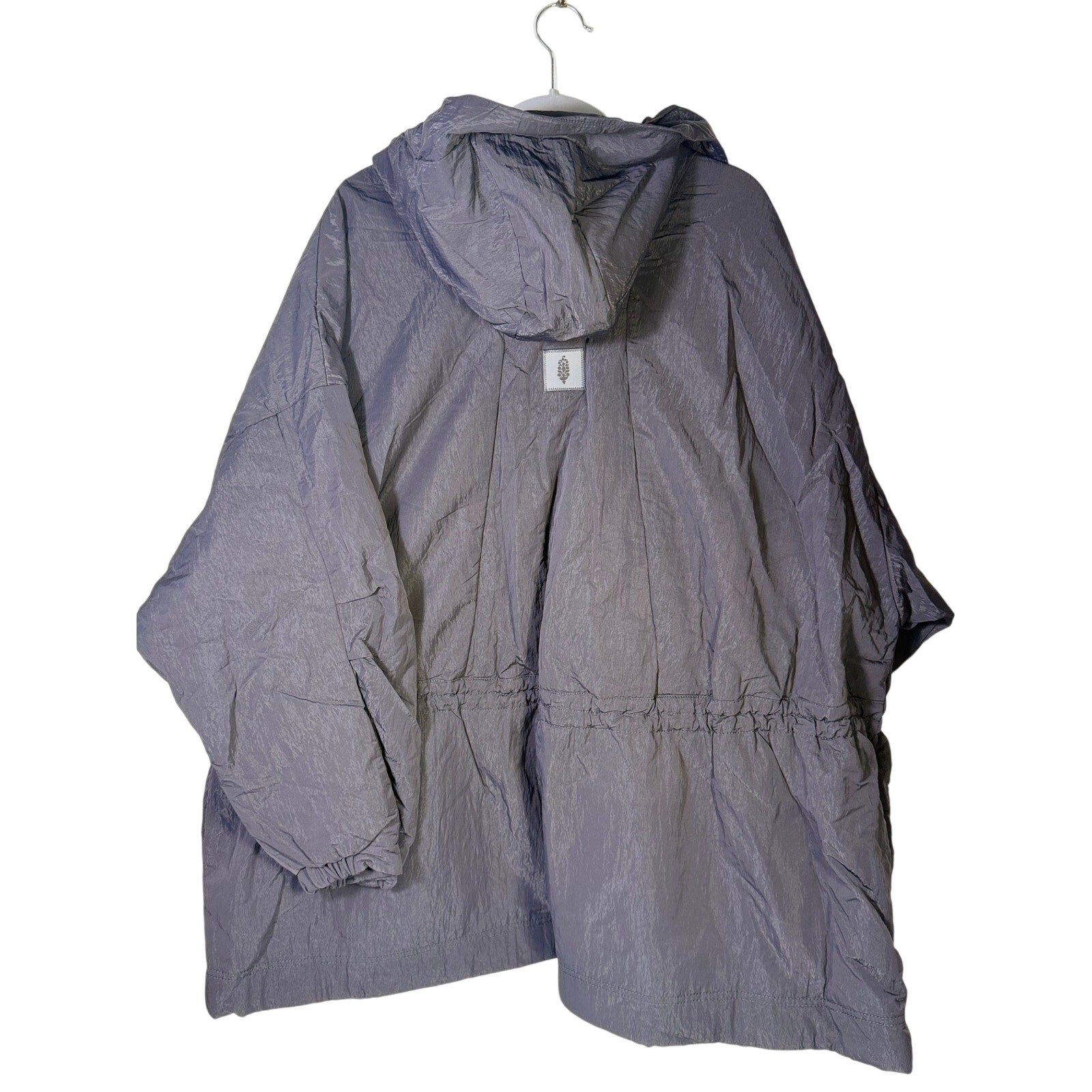Black hooded utility jacket for women by Free People, featuring a hood, multiple pockets, and a relaxed fit.