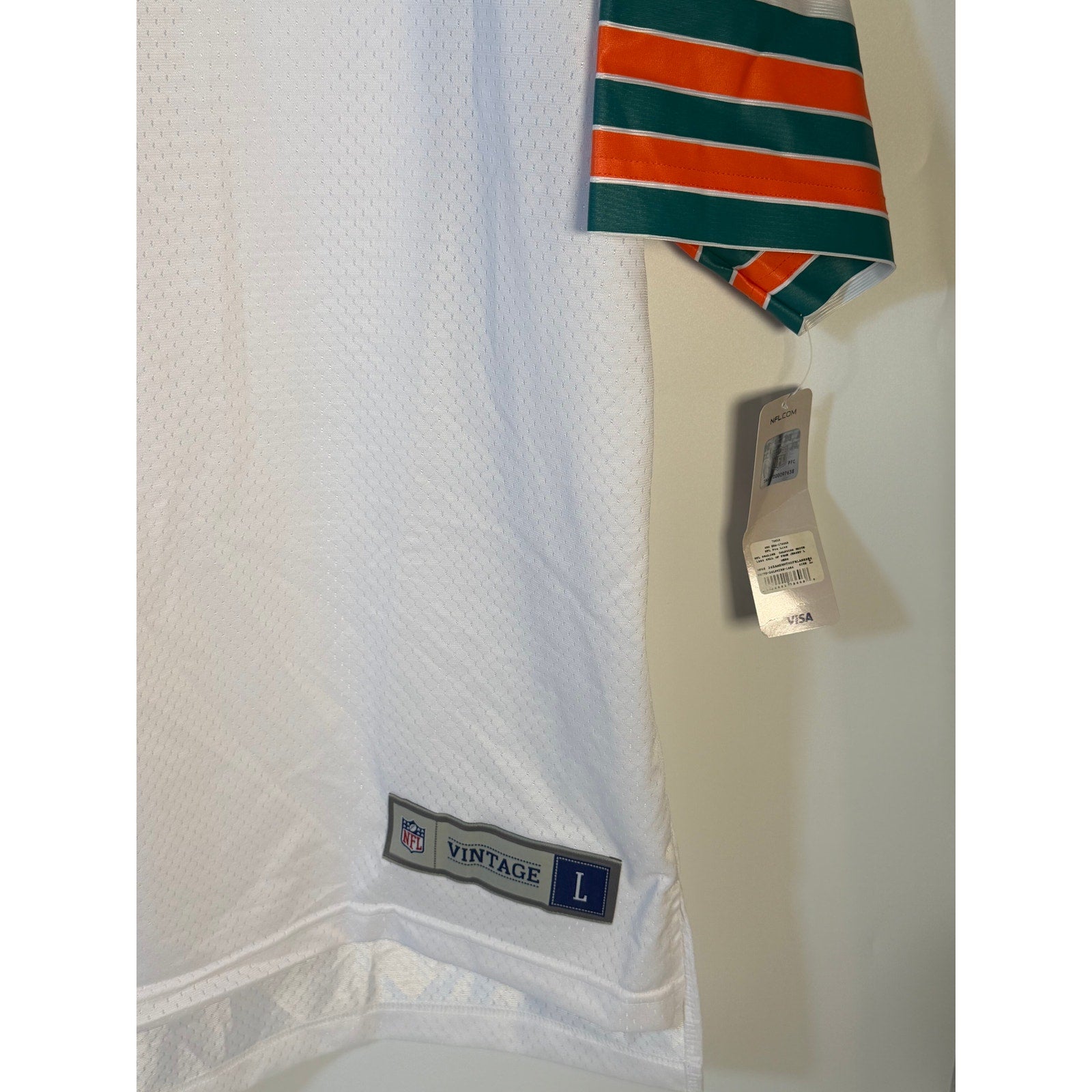 Men's white NFL Pro Line Miami Dolphins Hall of Fame jersey, large size, with team logo and player details visible.