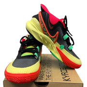 Nike Kyrie 8 GO basketball shoes for grade school in black and lemon chiffon, featuring sleek design and Nike branding.