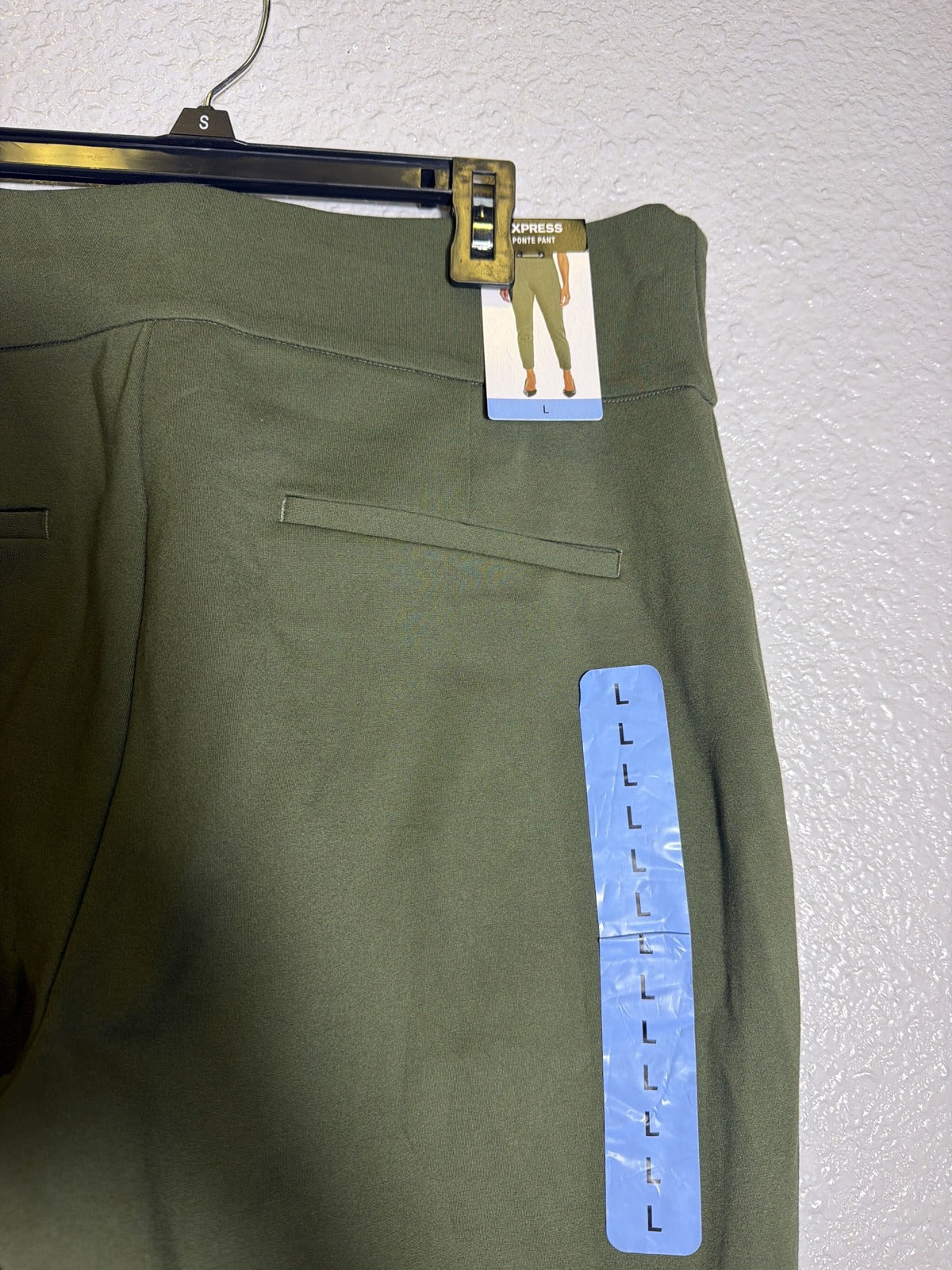 Olive green women's Express ponte pull-on ankle pants, size L, displayed flat on a white background.