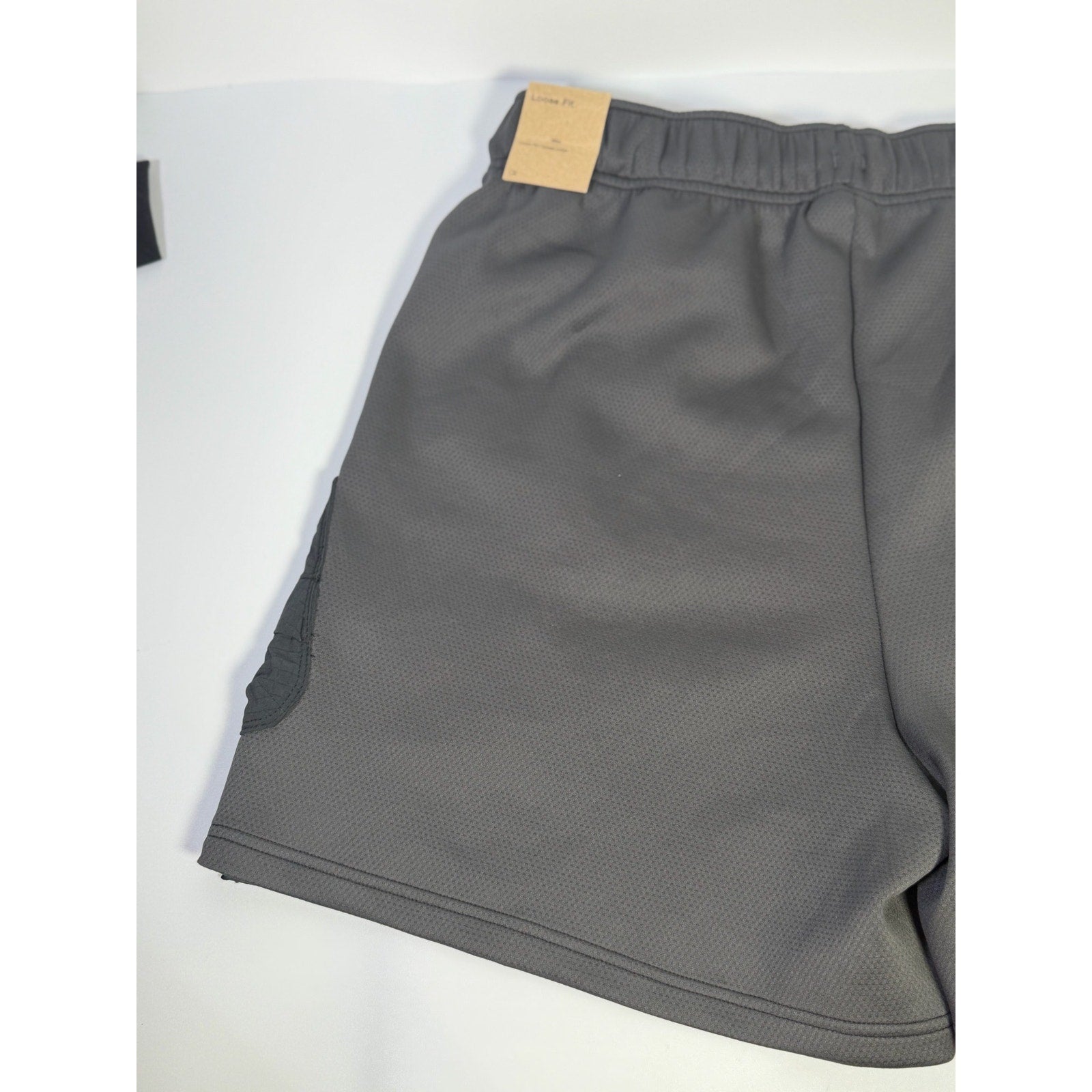 Nike ACG Death Bloom women’s black cargo shorts, size M, featuring multiple pockets and a casual fit.