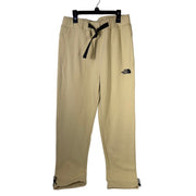 The North Face men's AXYS sweatpants in gravel beige, size small, with drawstring waist and logo detailing, laid flat.