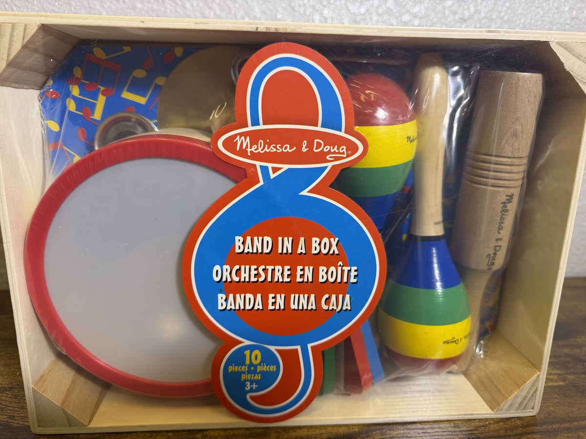 Melissa & Doug Band in a Box 10-piece wooden musical instrument set with tambourine, maracas, and cymbals for kids.