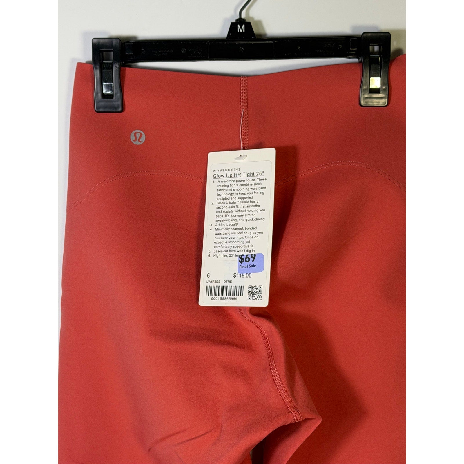 Lululemon Glow Up HR Tight 25-inch women's red leggings, form-fitting with a high-rise waistband and smooth fabric.