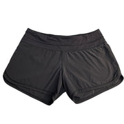 Lululemon women's black running shorts with zip back pocket, size 8, lightweight athletic shorts for active wear.