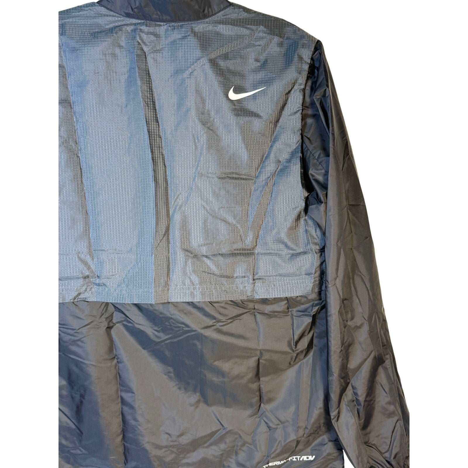 Gray Nike Golf Therma-FIT Repel jacket for men, small size, full-zip windbreaker with lightweight, insulated design.