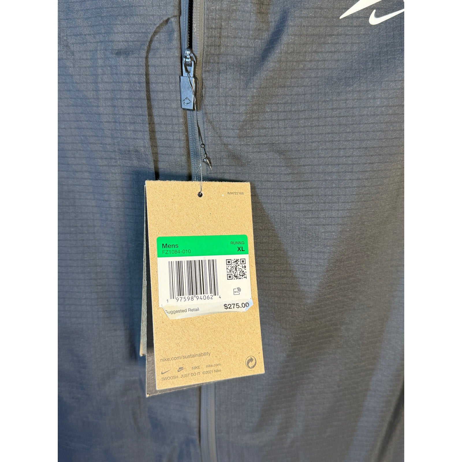 Men's Nike Running Windrunner gray hooded jacket, full zip, lightweight windbreaker in XL size, with Nike branding and hood detail