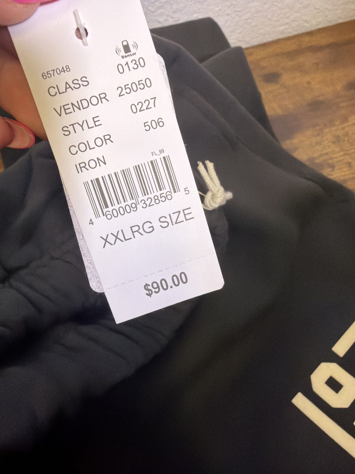 Fear of God Essentials 1977 gray sweatpants in XXL size, showing relaxed fit and soft fabric texture.