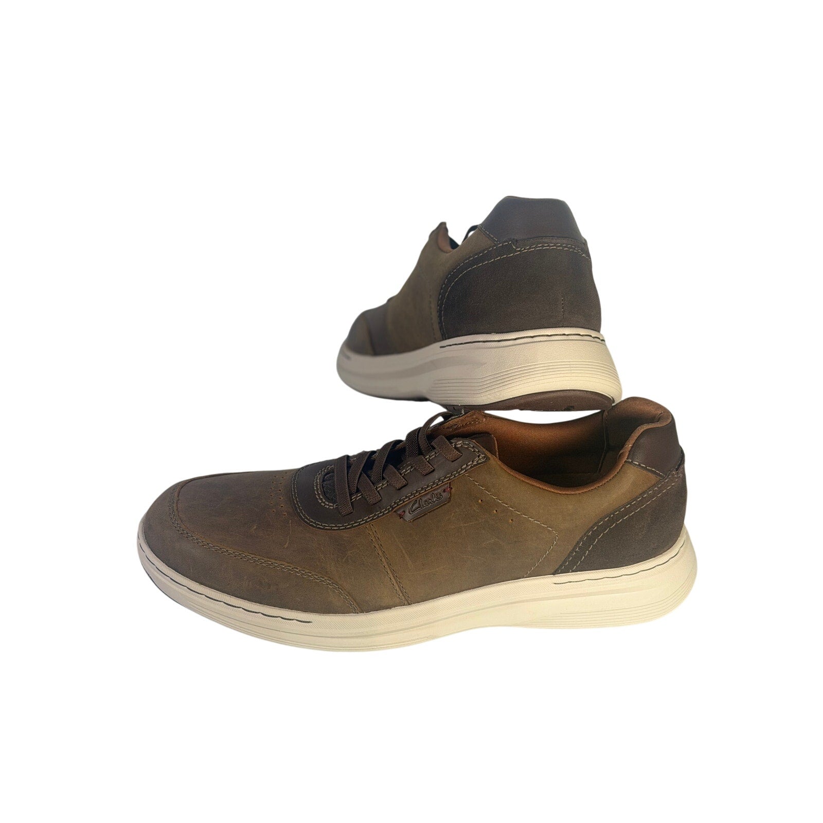 Clarks men's brown casual golf sneakers with lace-up design in size 10, new in box, featuring comfortable casual footwear.