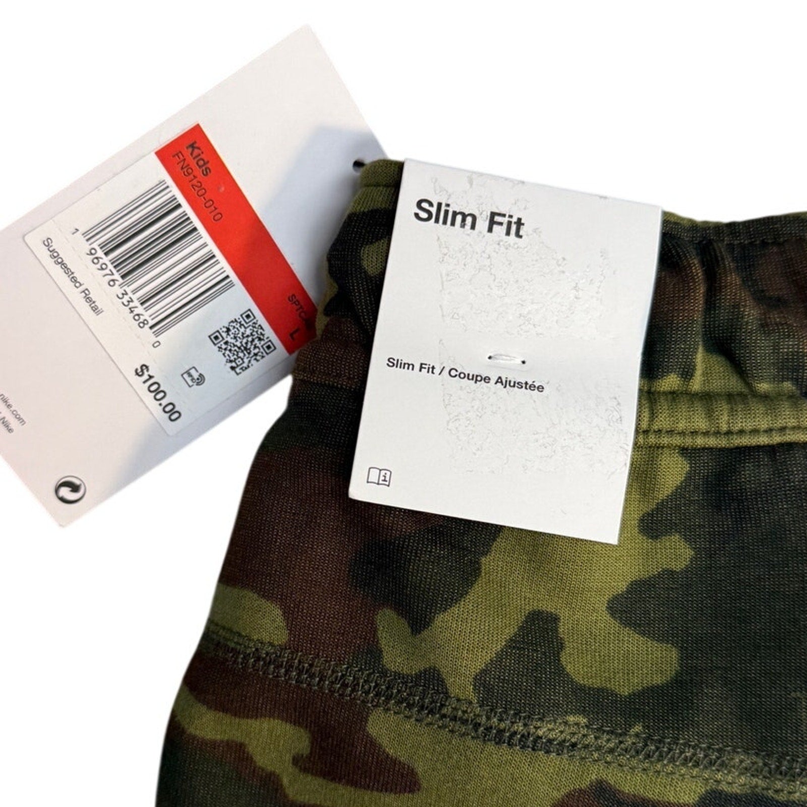 Nike Sportswear Tech Camo Joggers for youth, size medium, featuring camouflage pattern and athletic fit.