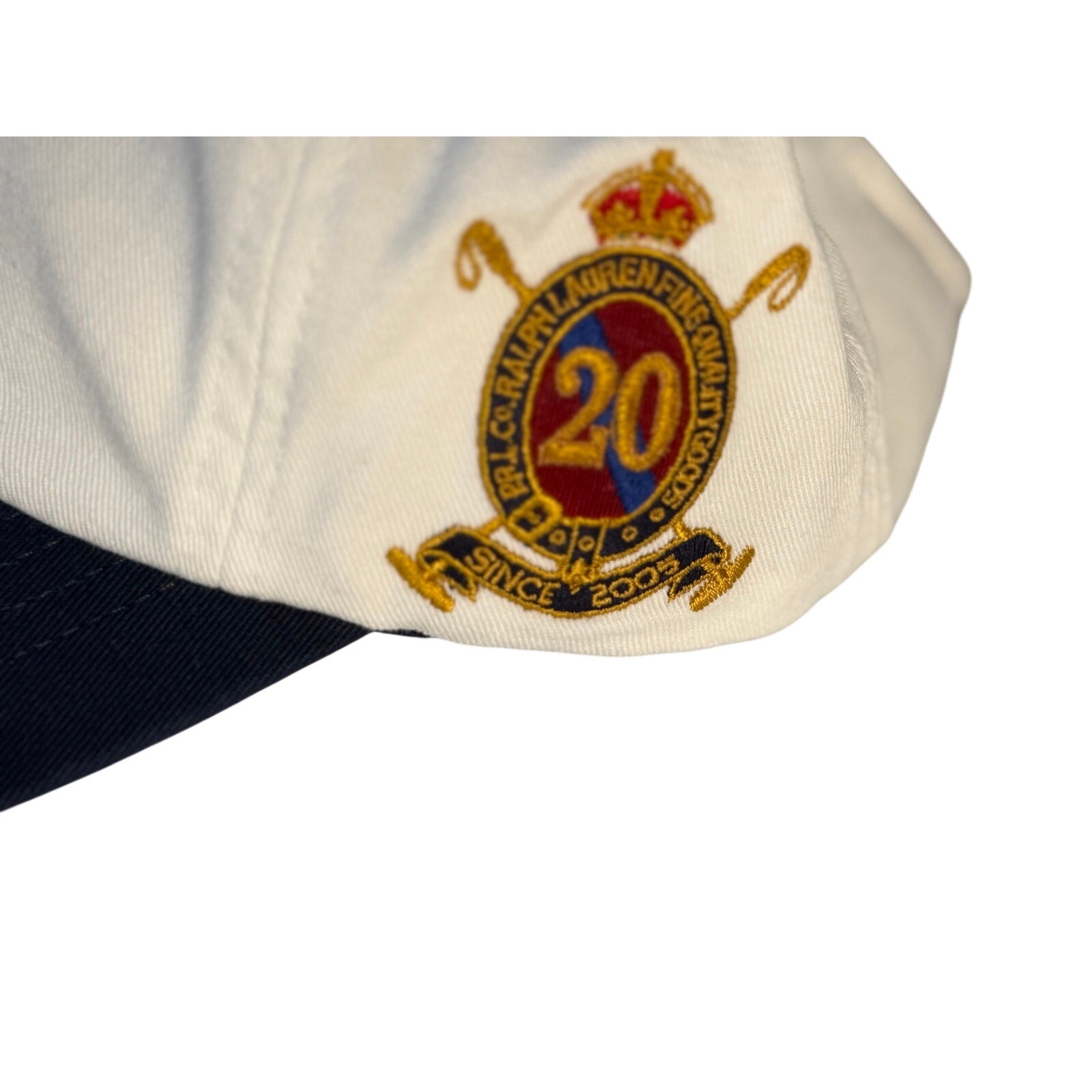 White Polo Ralph Lauren baseball cap with 20th Anniversary Big Pony logo, adjustable strap, and classic design.