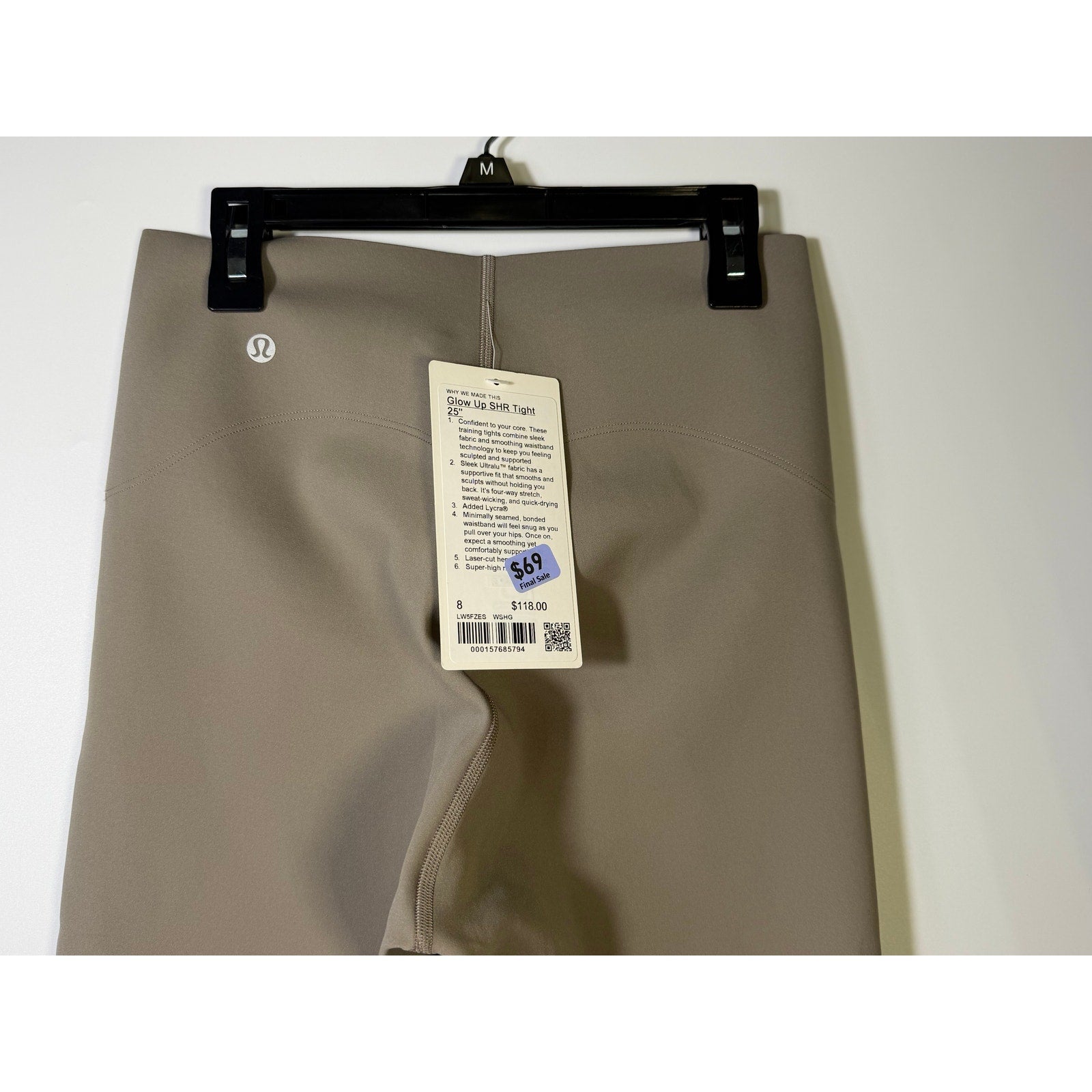 Lululemon Glow Up Super-High-Rise Leggings in taupe gray, size 8, showing the fitted high-rise waistband and sleek fabric.
