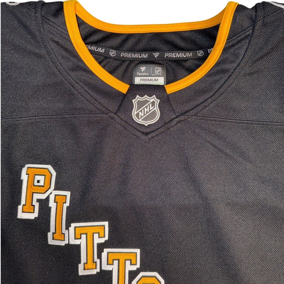 Fanatics Pittsburgh Penguins Erik Karlsson #65 NHL premium hockey jersey in size 56, featuring team logo and player name on the back.