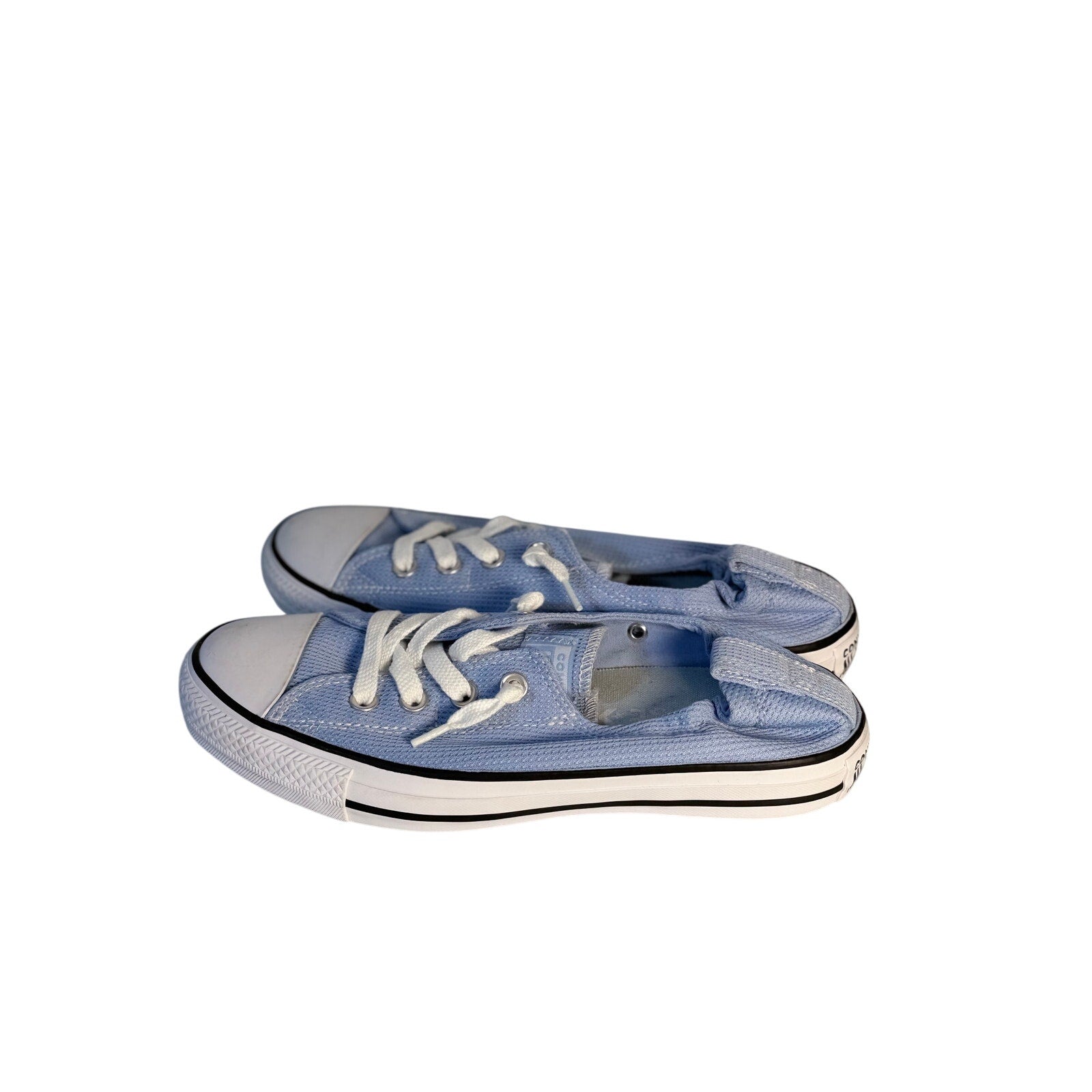 Light blue Converse Chuck Taylor All Star Shoreline slip-on sneakers for women, size 9, with canvas upper and casual style.