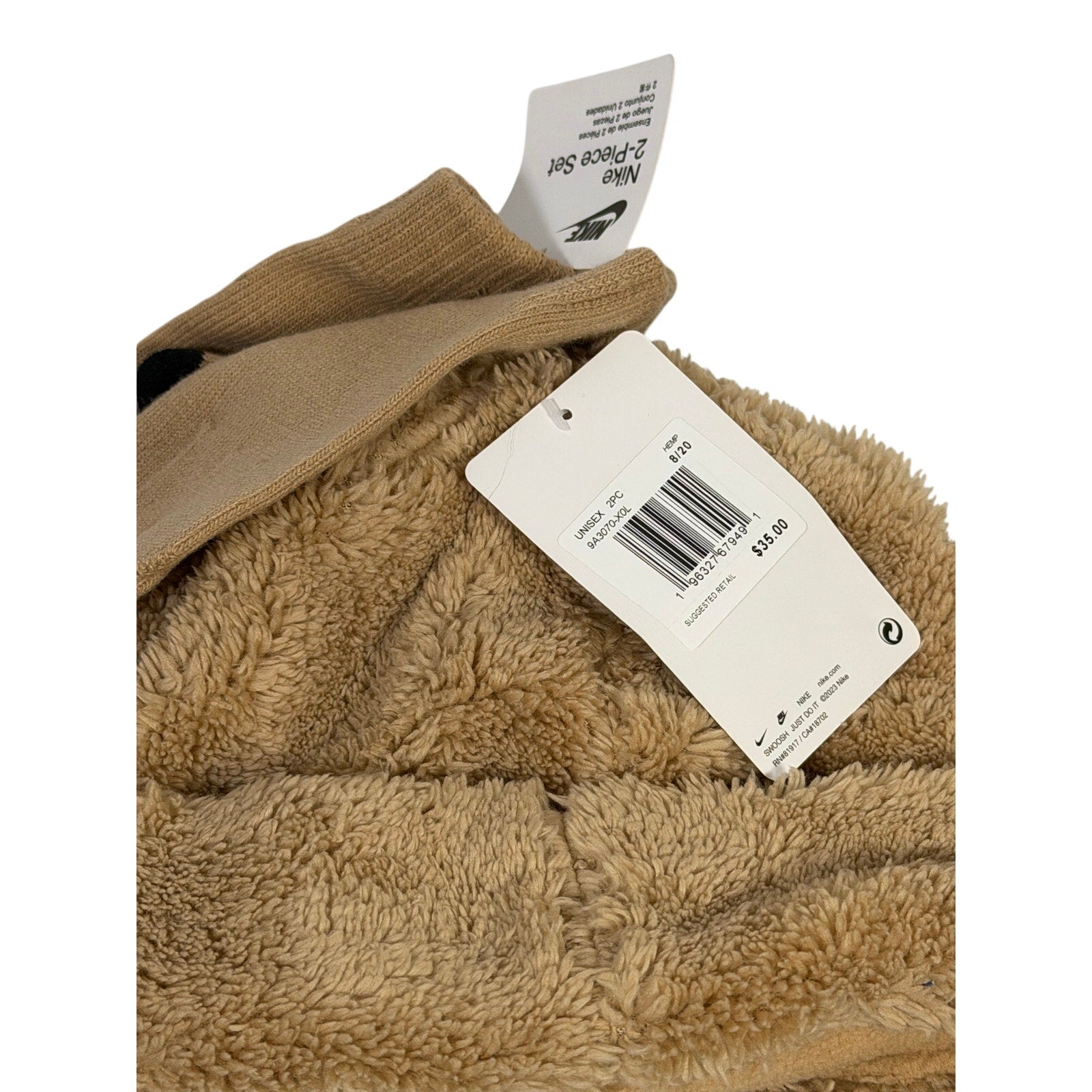 Nike tan Sherpa neck warmer and touchscreen gloves 2-piece set, soft hat with cozy lining and warm winter accessories.
