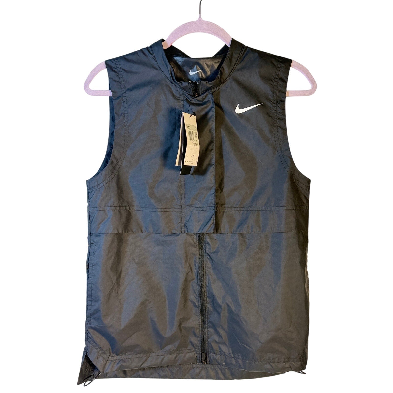 Nike Golf Women's gray Storm-FIT sleeveless full-zip vest with stand collar, size XS, displayed flat on white background.