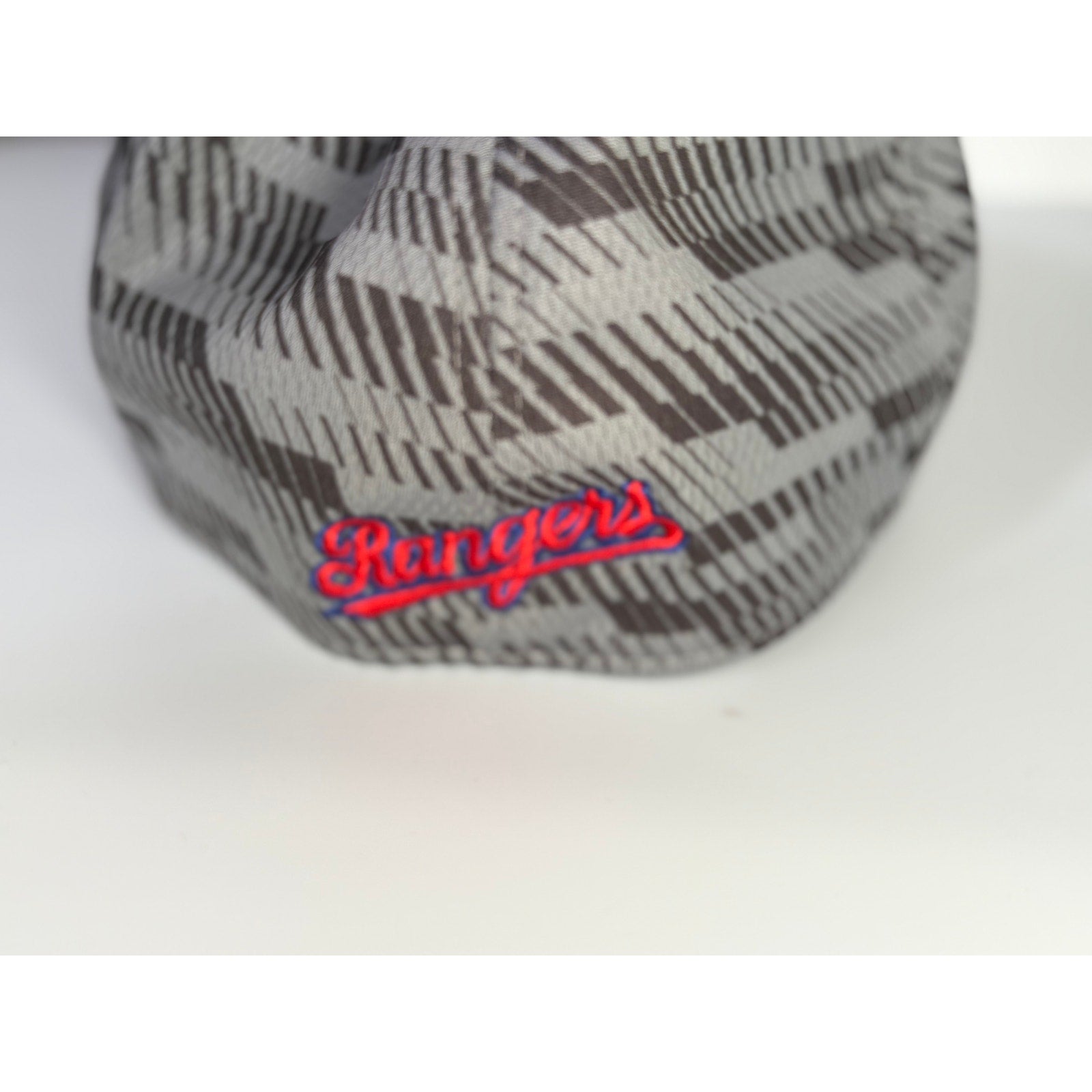 New Era Texas Rangers 39THIRTY Gray Camo Flex Fit Hat, L/XL, MLB logo, stylish baseball cap with curved brim and adjustable fit.
