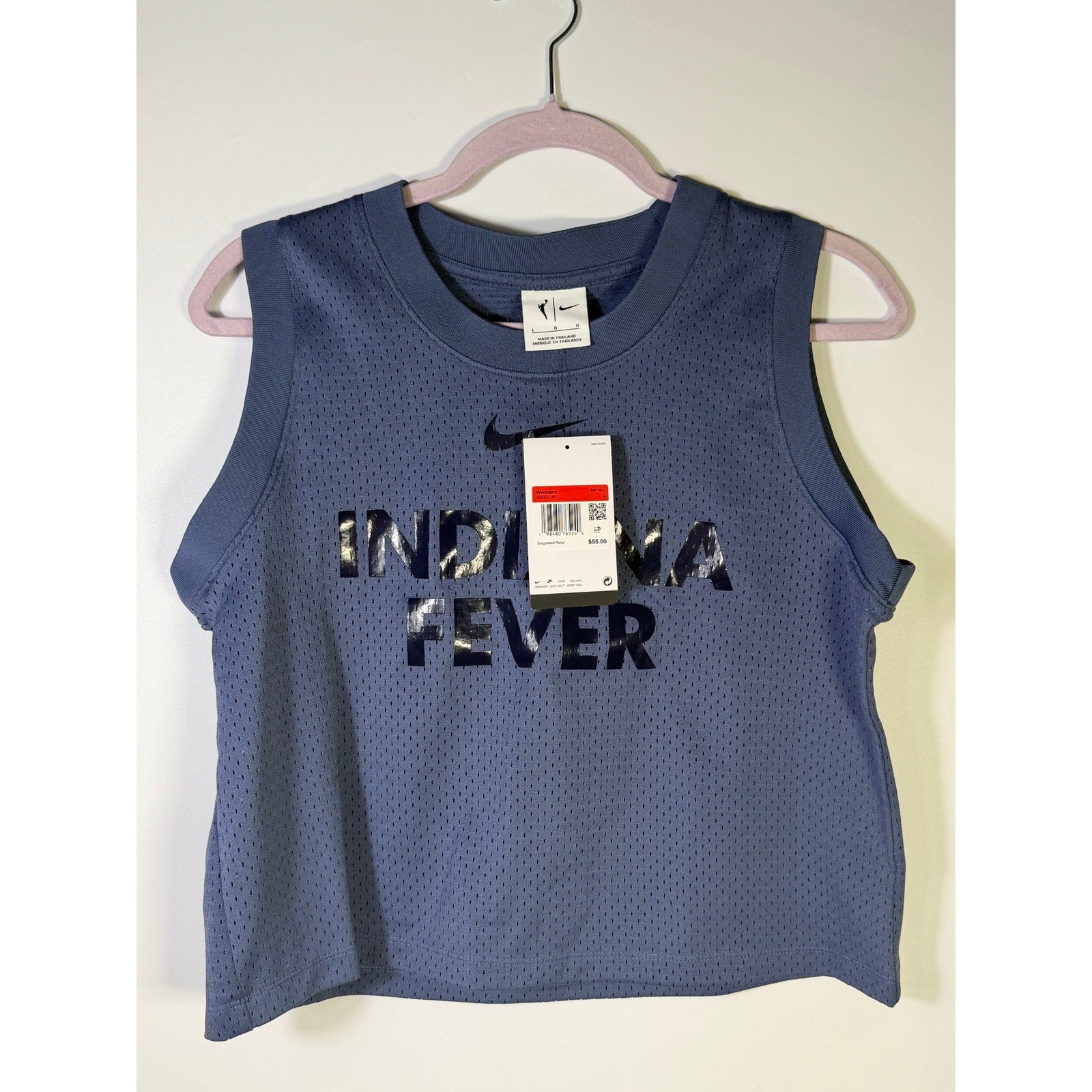 Nike WNBA Indiana Fever women's blue mesh basketball tank top, size L, new with tags, lightweight and breathable athletic apparel.