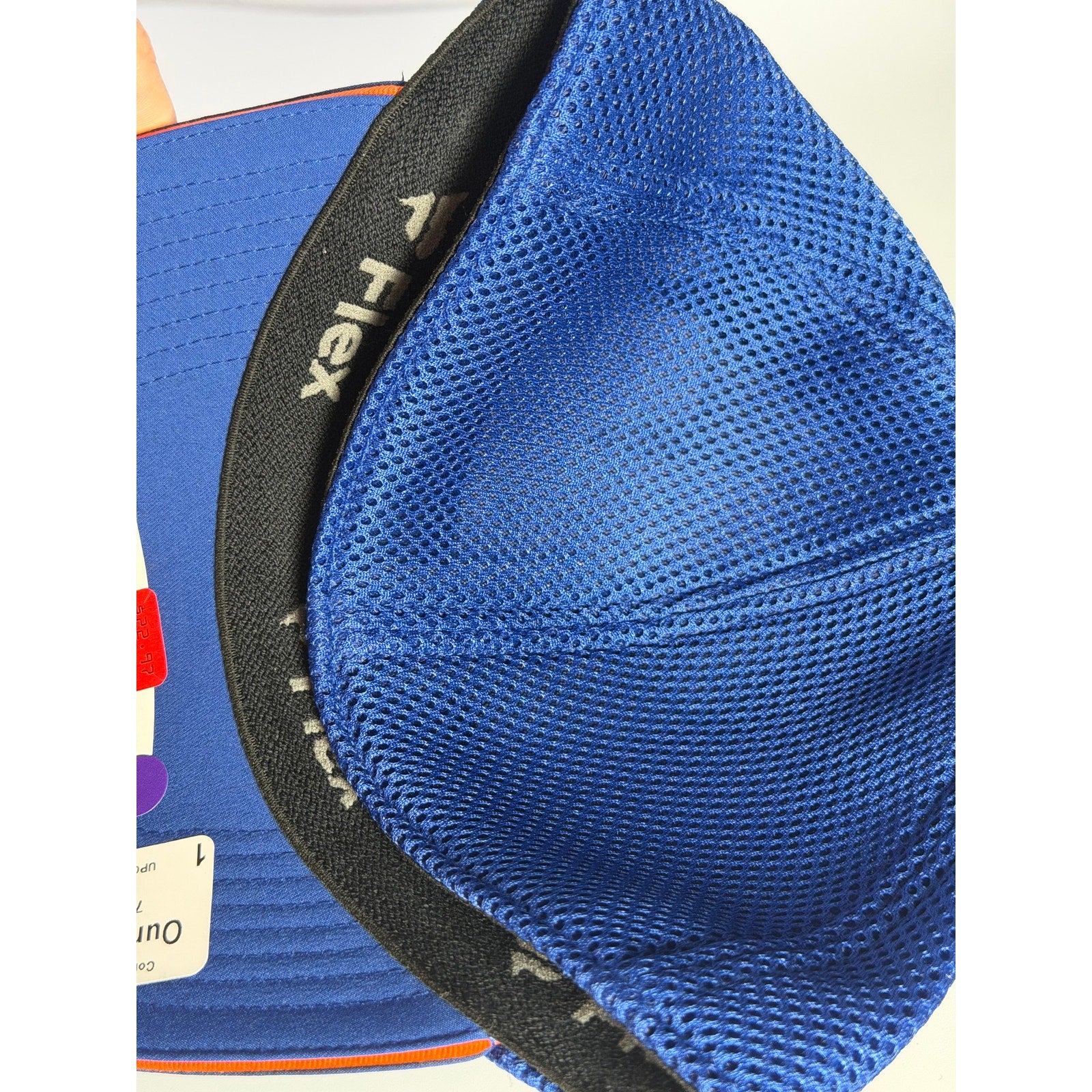 Fanatics New York Islanders NHL stretch fit mesh hat in blue, medium/large size with adjustable fit.