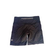 Lululemon women's high-rise black biker shorts with pockets, size 2, made from stretchy athletic fabric, shown on a model.