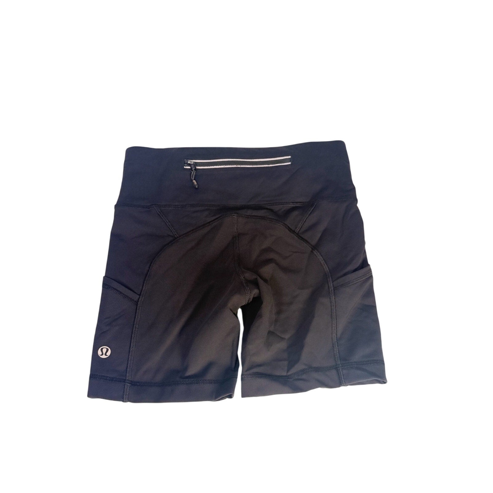 Lululemon women's high-rise black biker shorts with pockets, size 2, made from stretchy athletic fabric, shown on a model.